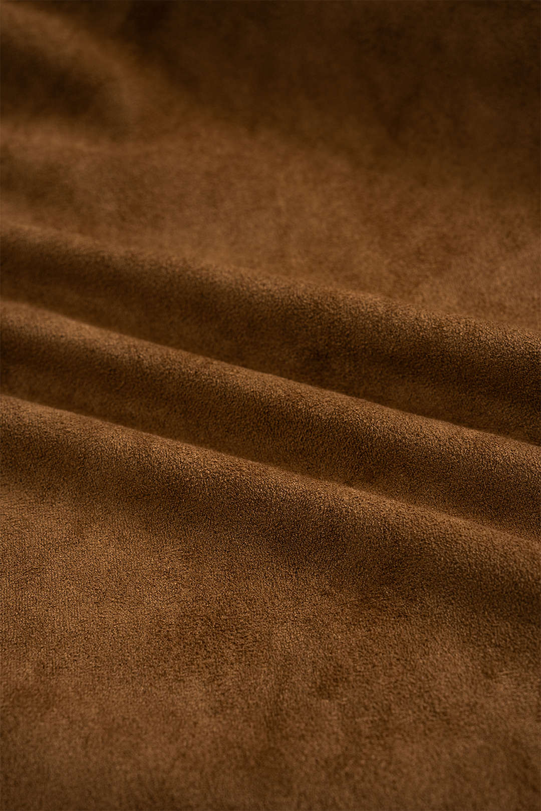 חצאית גבוהה עם חגורה מזמש ומכפלת לא סדירה 