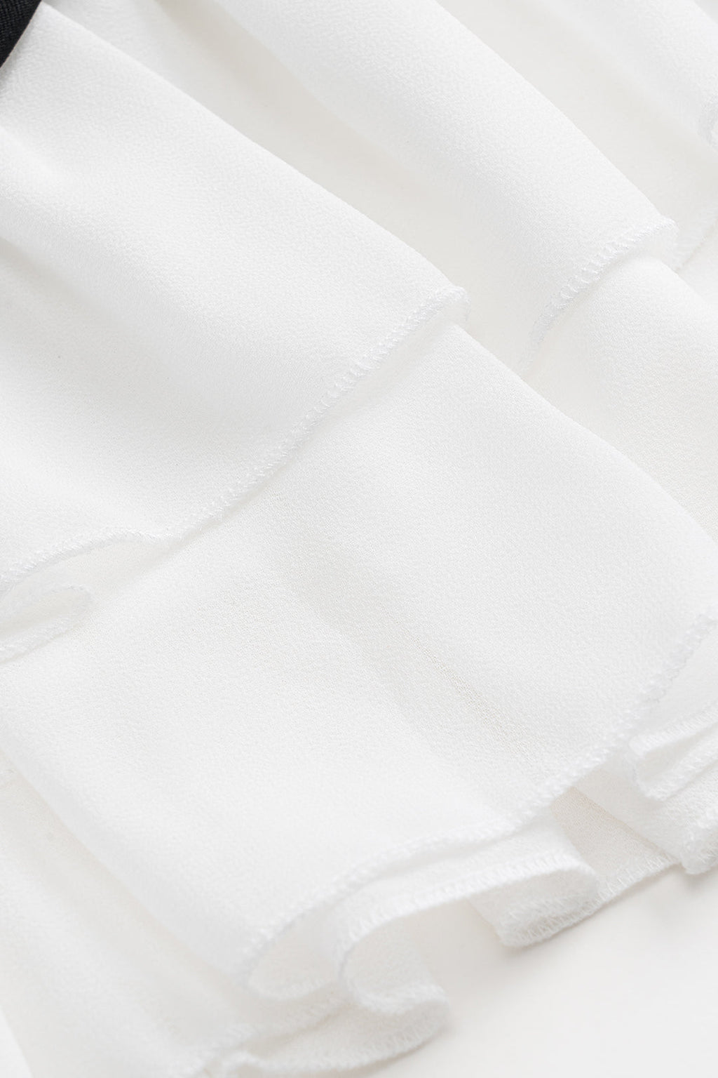 חצאית שיפון עם קפלים וטלאים 