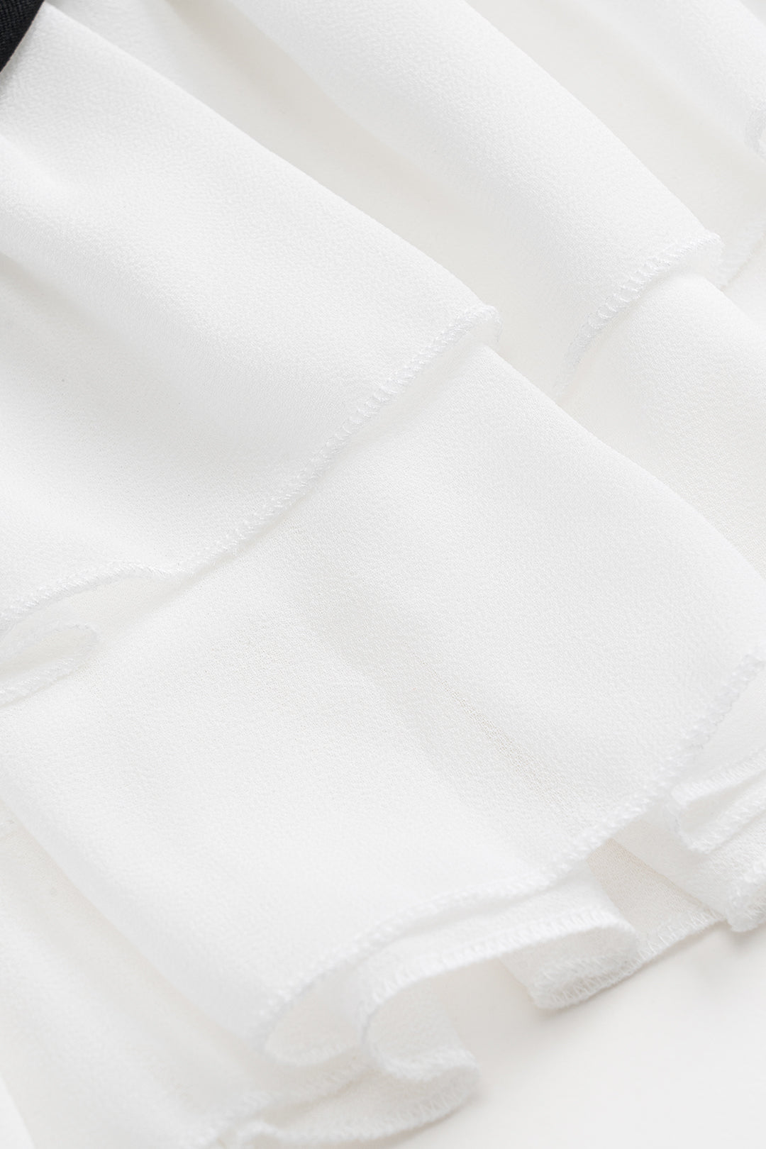 חצאית שיפון עם קפלים וטלאים 