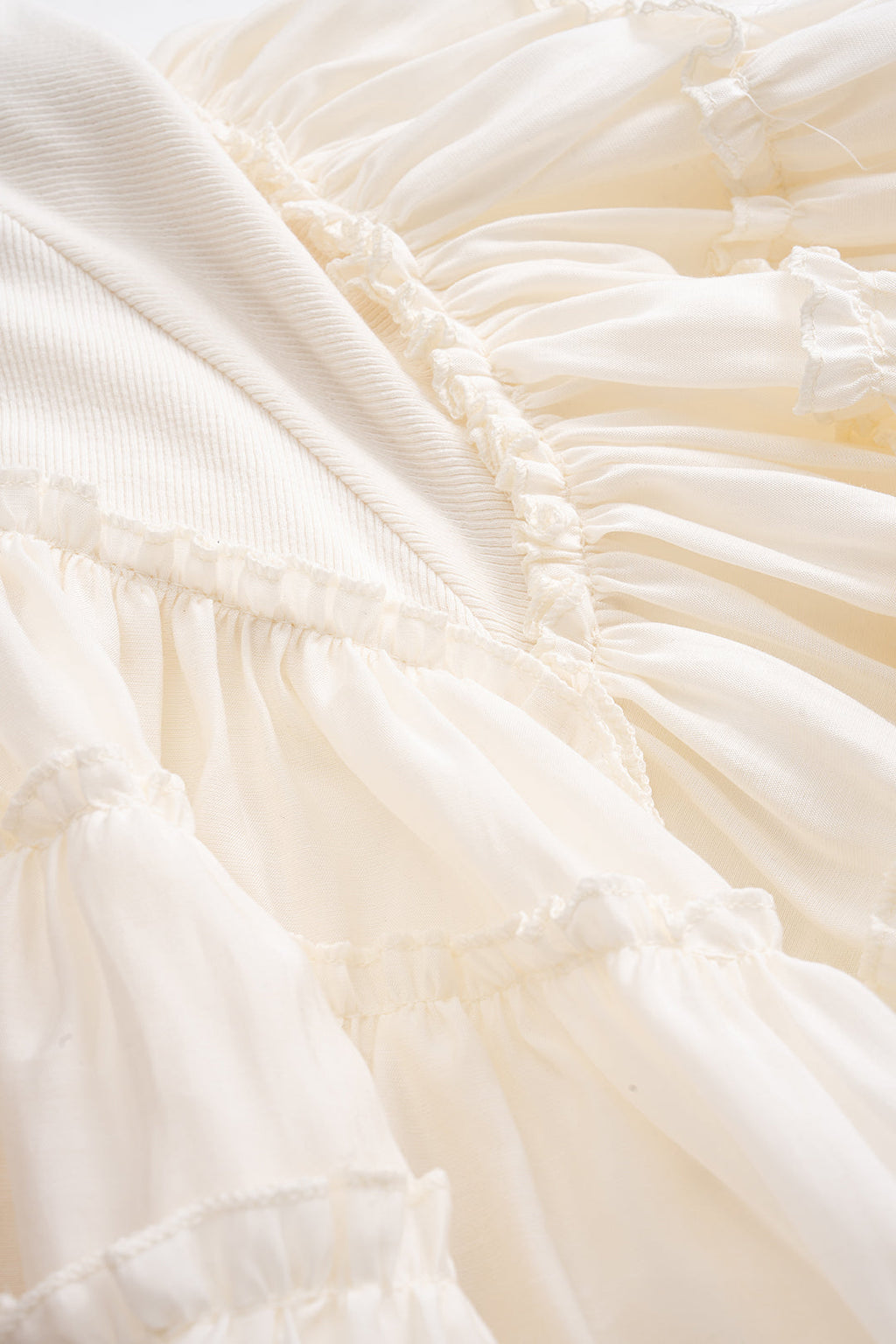 חצאית טלאים עם קפלים 