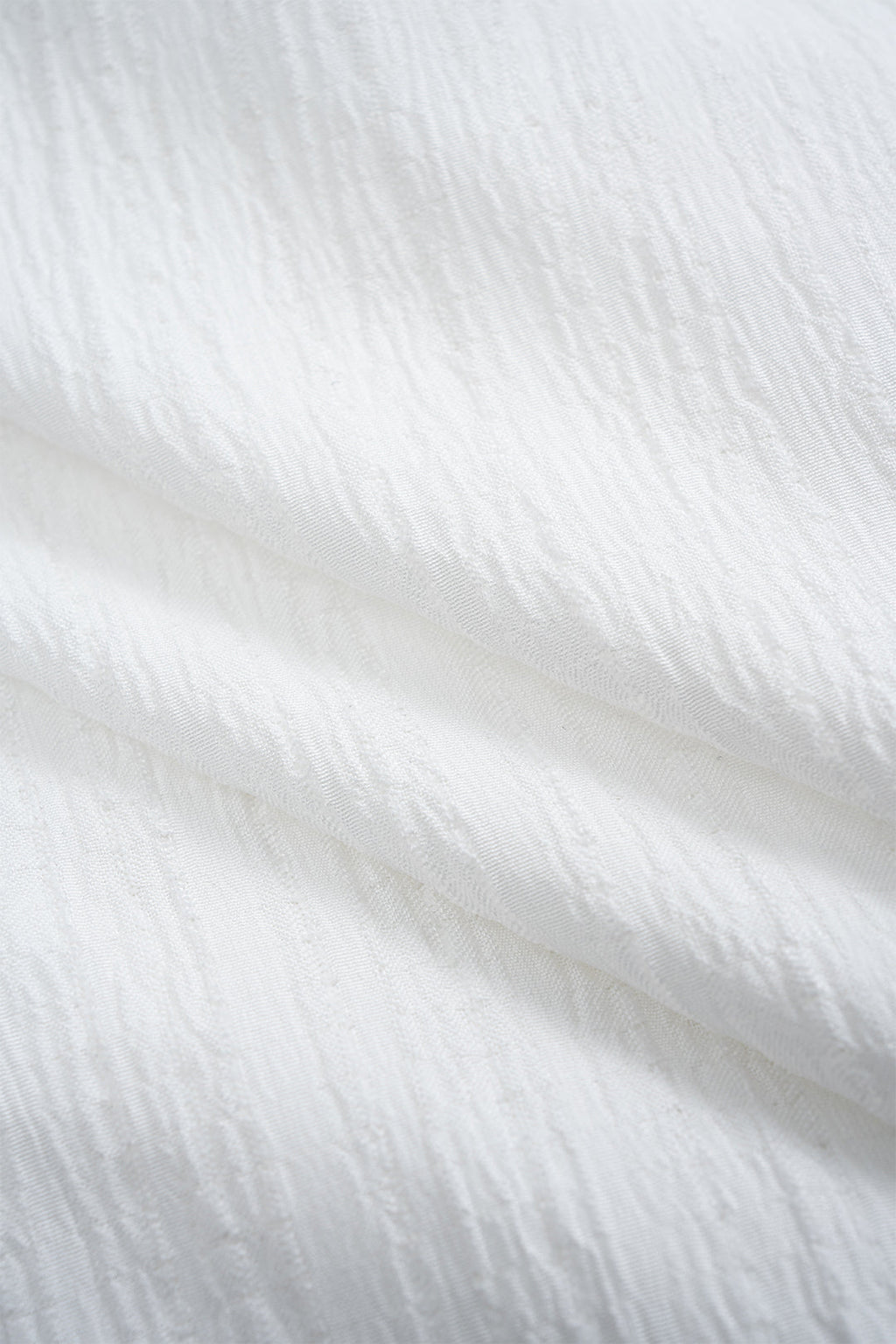 חולצה אסימטרית ללא גב עם שרוולים ארוכים מכופתרים 