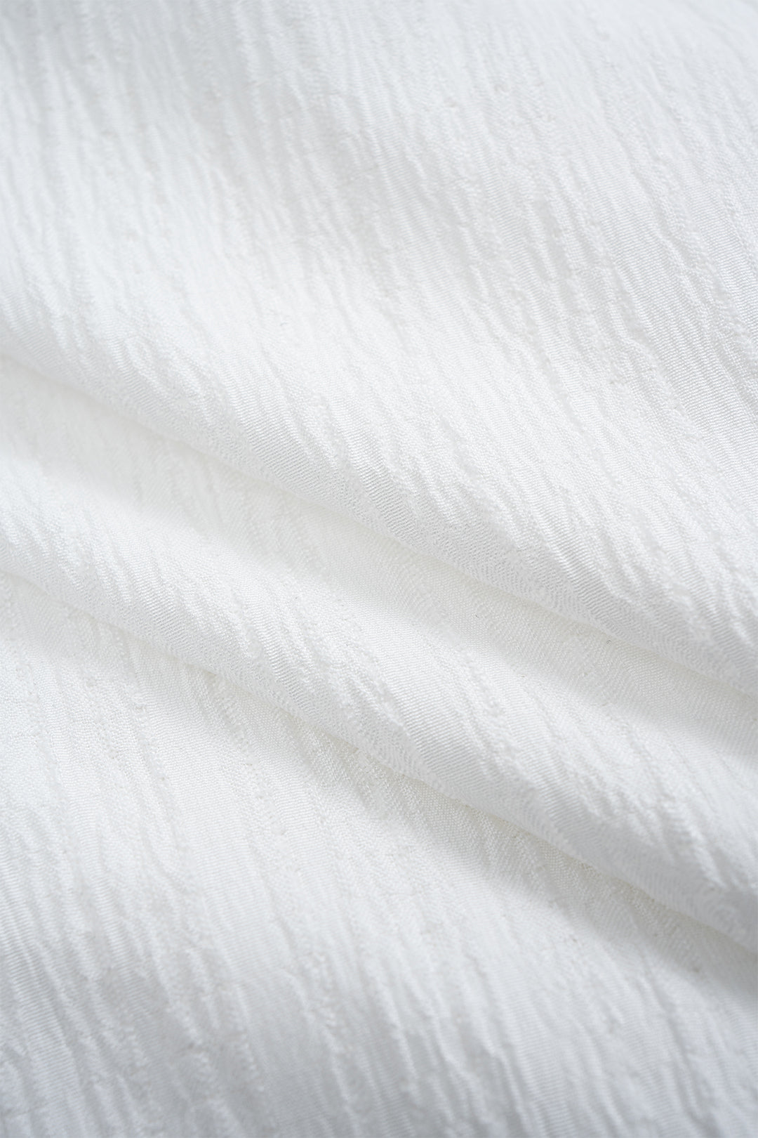 חולצה אסימטרית ללא גב עם שרוולים ארוכים מכופתרים 