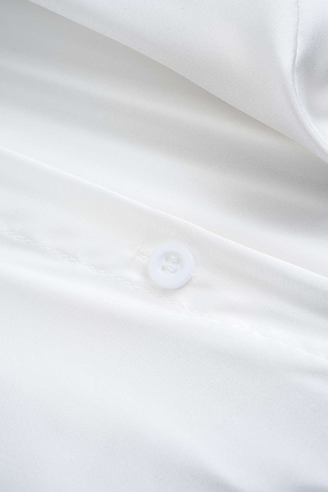 חולצה ארוכת שרוולים עם כפתורים וקשירה בגב 