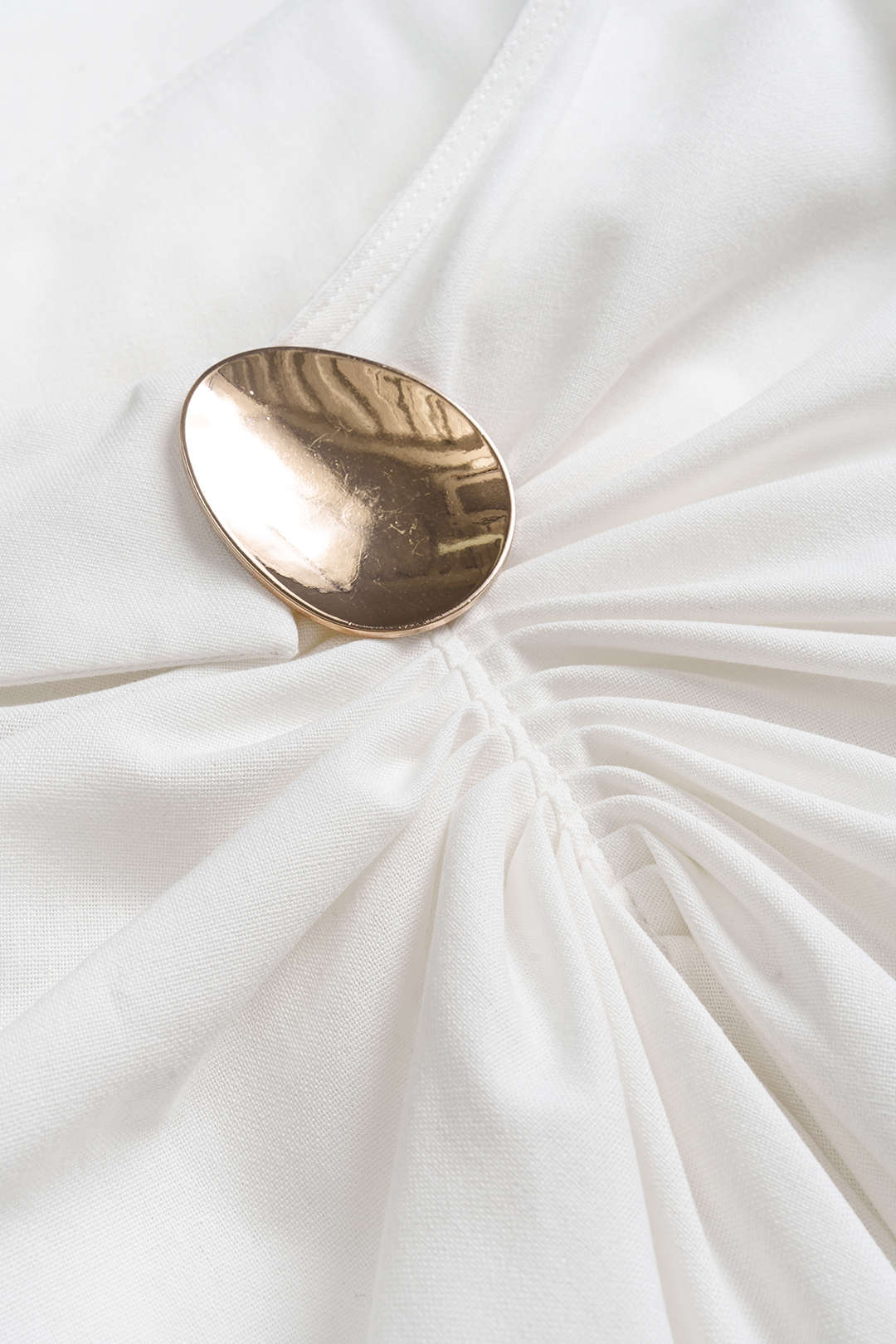 חצאית אסימטרית עם קפלים מפשתן 