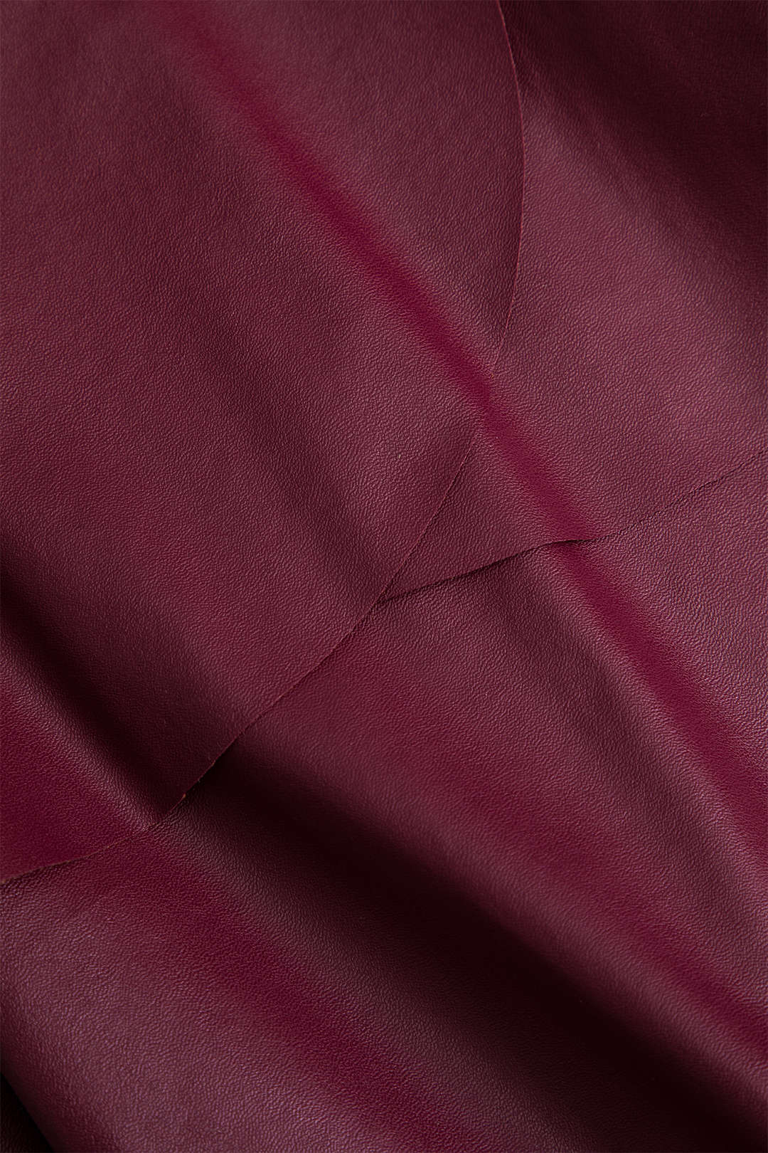 חצאית שכבות אסימטרית דמוית עור אחידה 