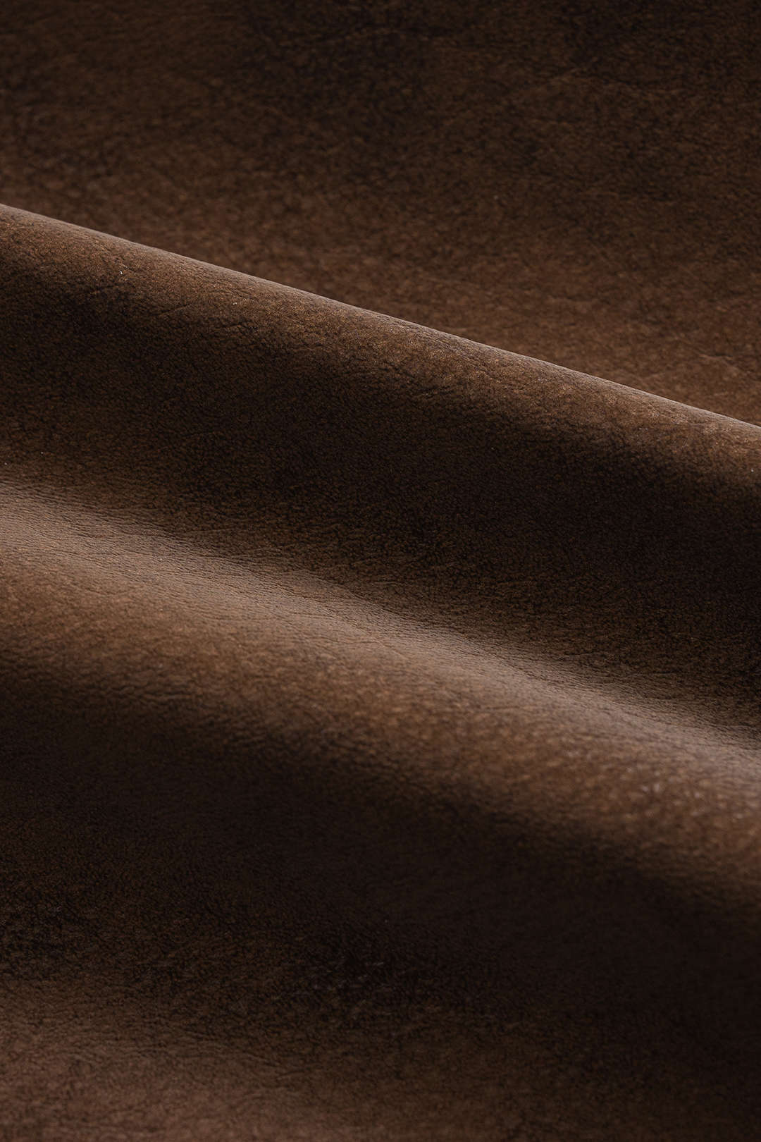 חצאית אסימטרית עם חגורה ורוכסן דמוית עור 