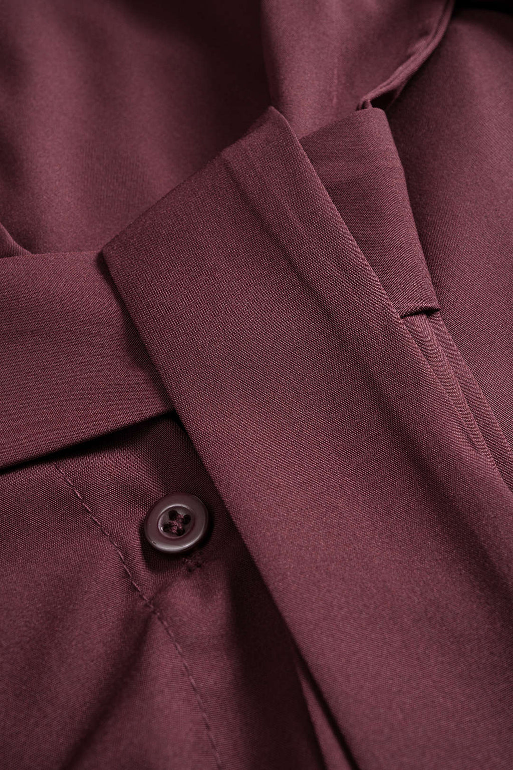 חולצה ארוכת שרוולים עם כפתורים וחגורה 