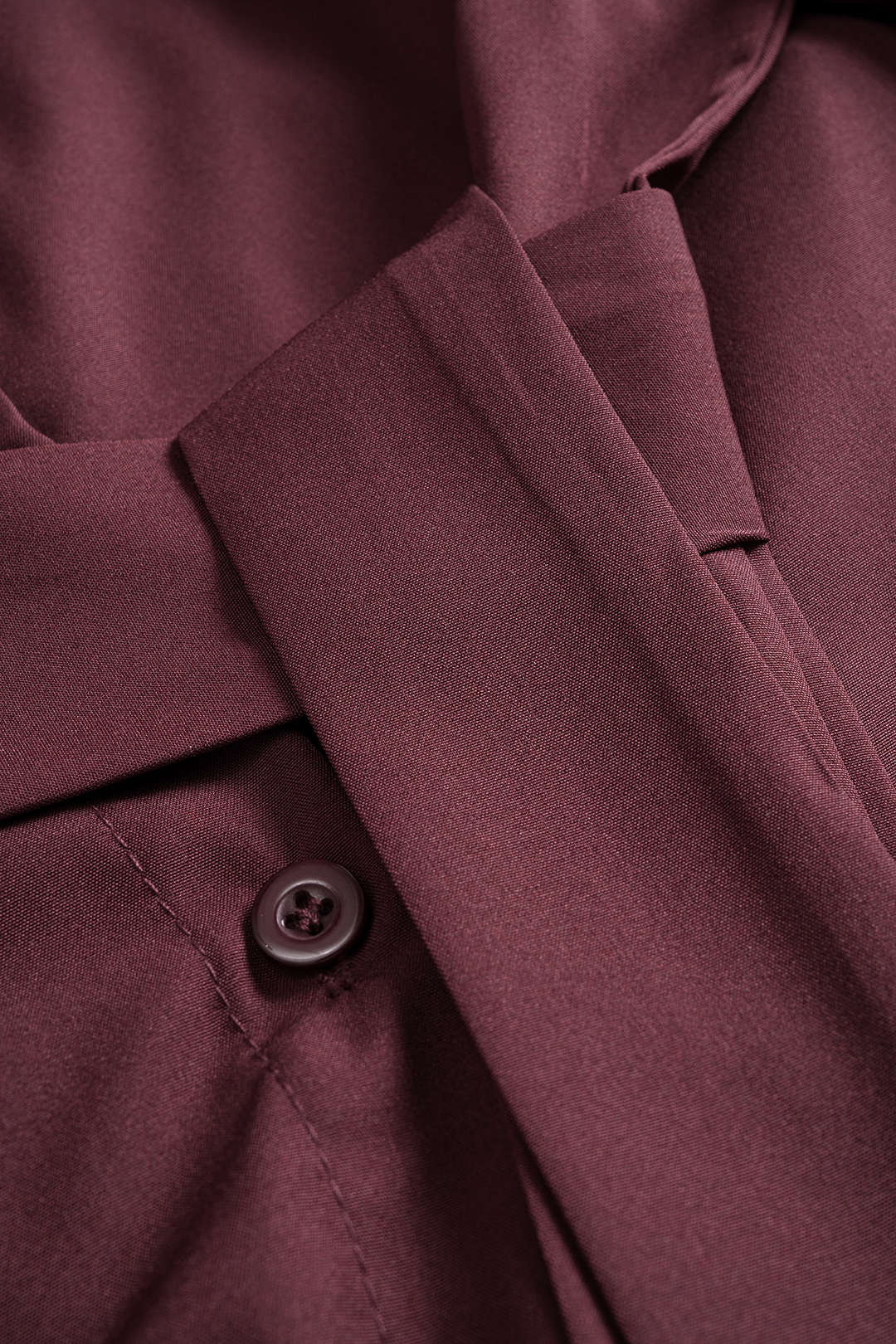 חולצה ארוכת שרוולים עם כפתורים וחגורה 