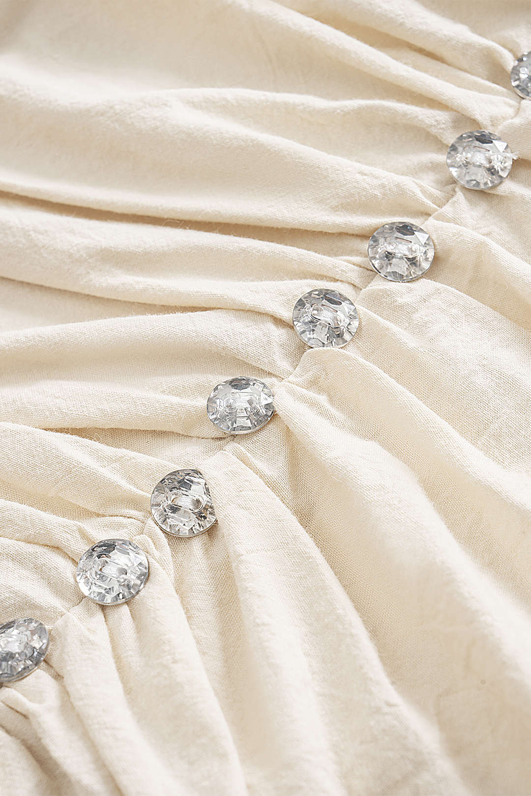 חצאית פשתן עם קפלים ואבני חן 