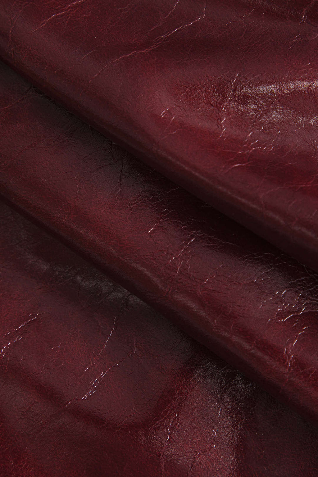 חצאית אסימטרית עם כפתורים בגזרה חלקה של PU 