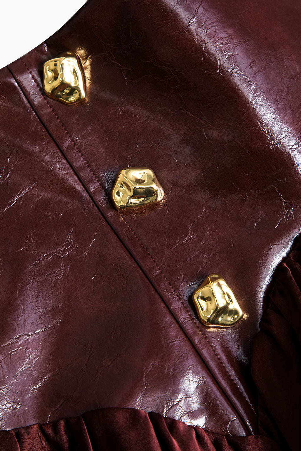 חצאית טלאים דמוית עור 