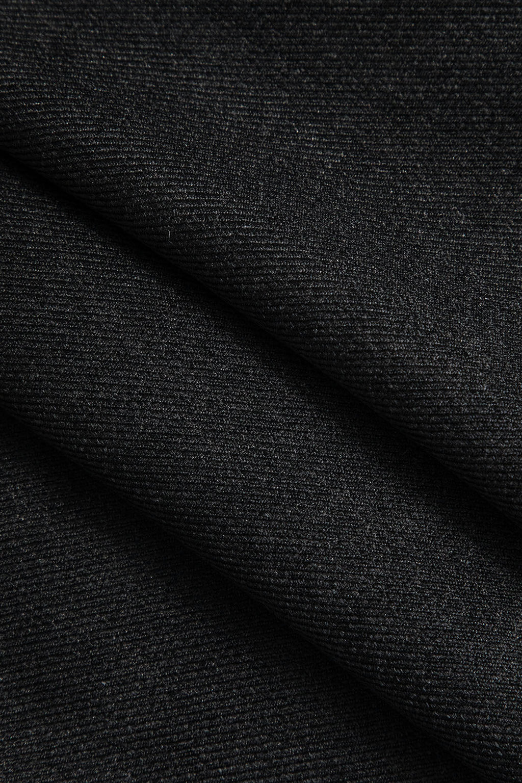 חצאית אסימטרית עם קפלים בצבע בלוק צבעוני 