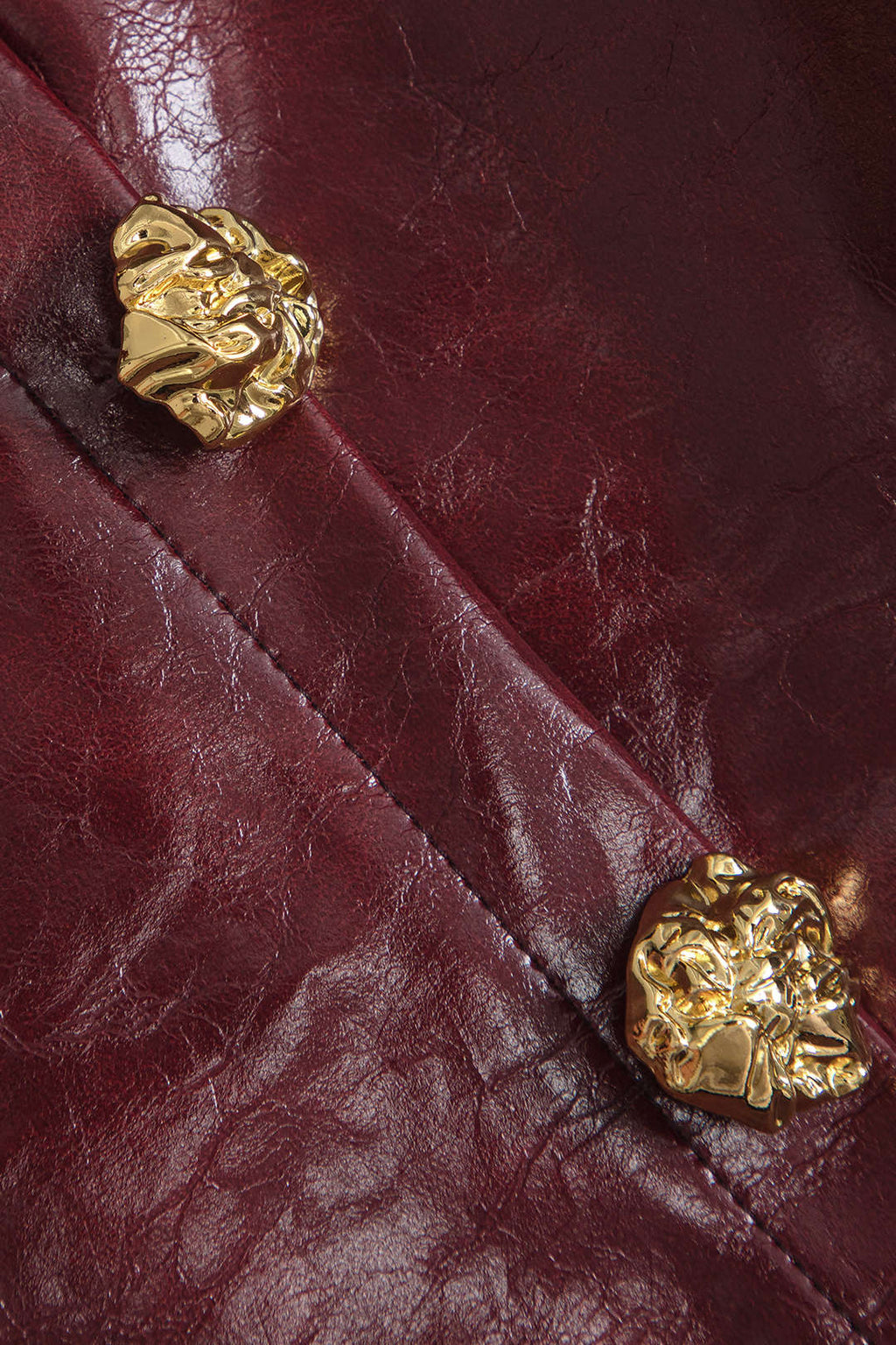 חצאית אסימטרית עם כפתורים בגזרה חלקה של PU 