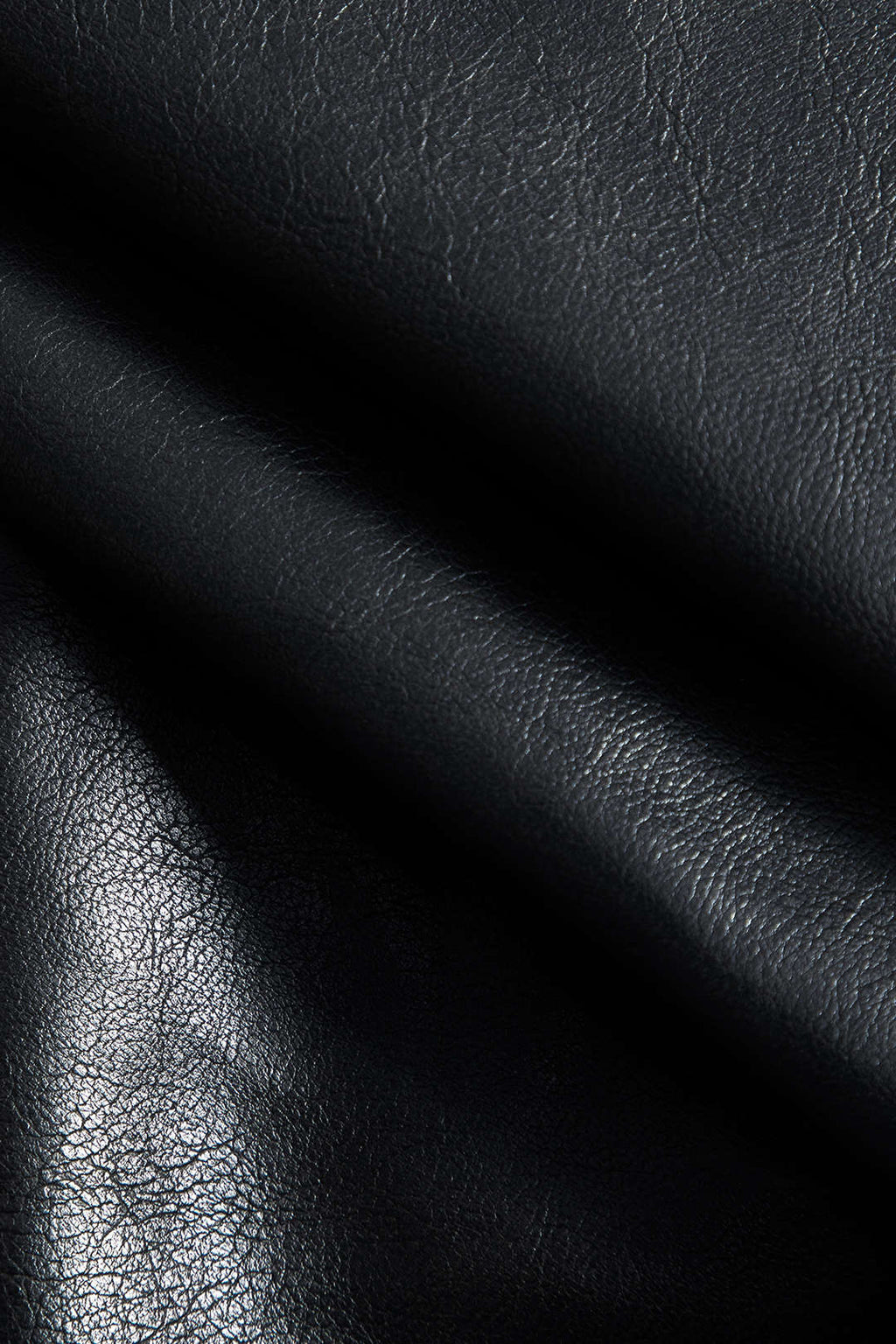 חצאית פרווה דמוית עור מבד טלאים 