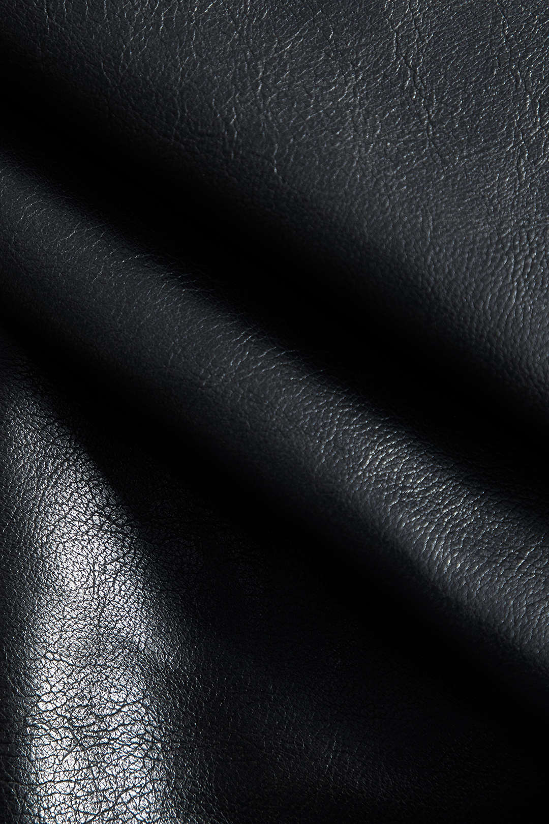 חצאית פרווה דמוית עור מבד טלאים 