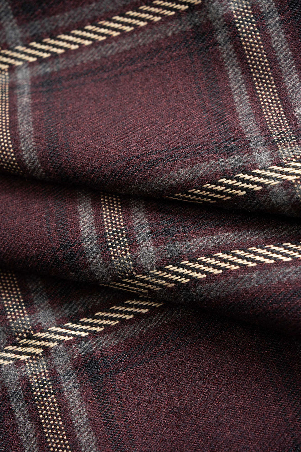 חצאית אסימטרית עם הדפס משובץ וזמש טלאים 