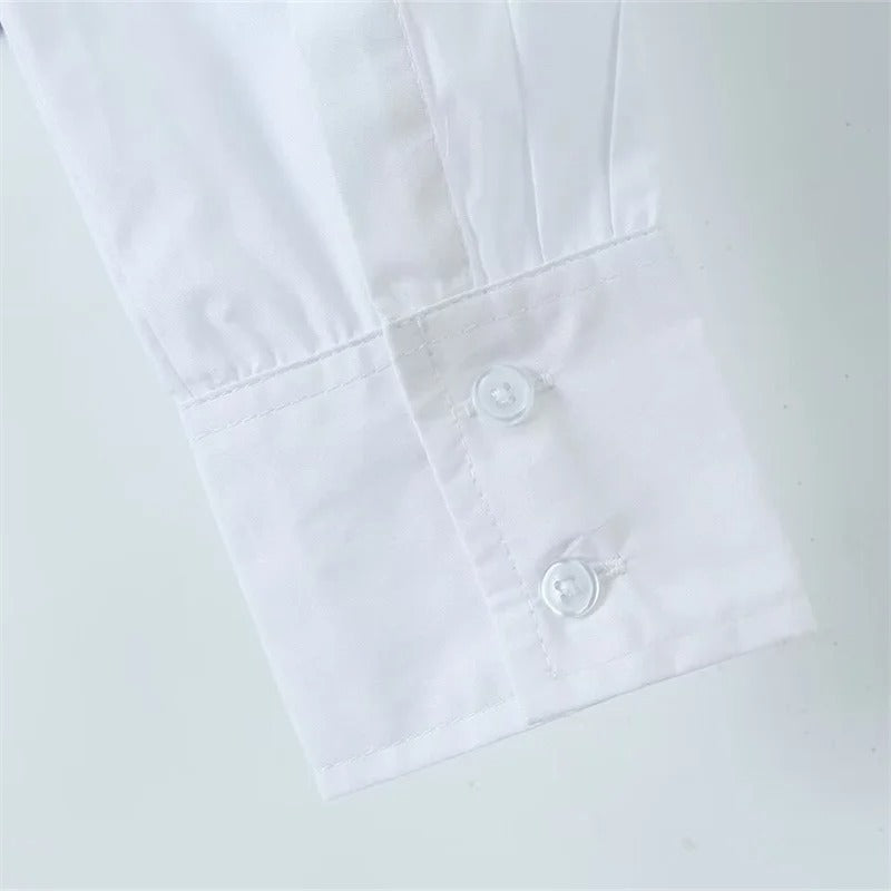 Blusa Elegante con Detalle Blanco y Silueta Corsé Negra